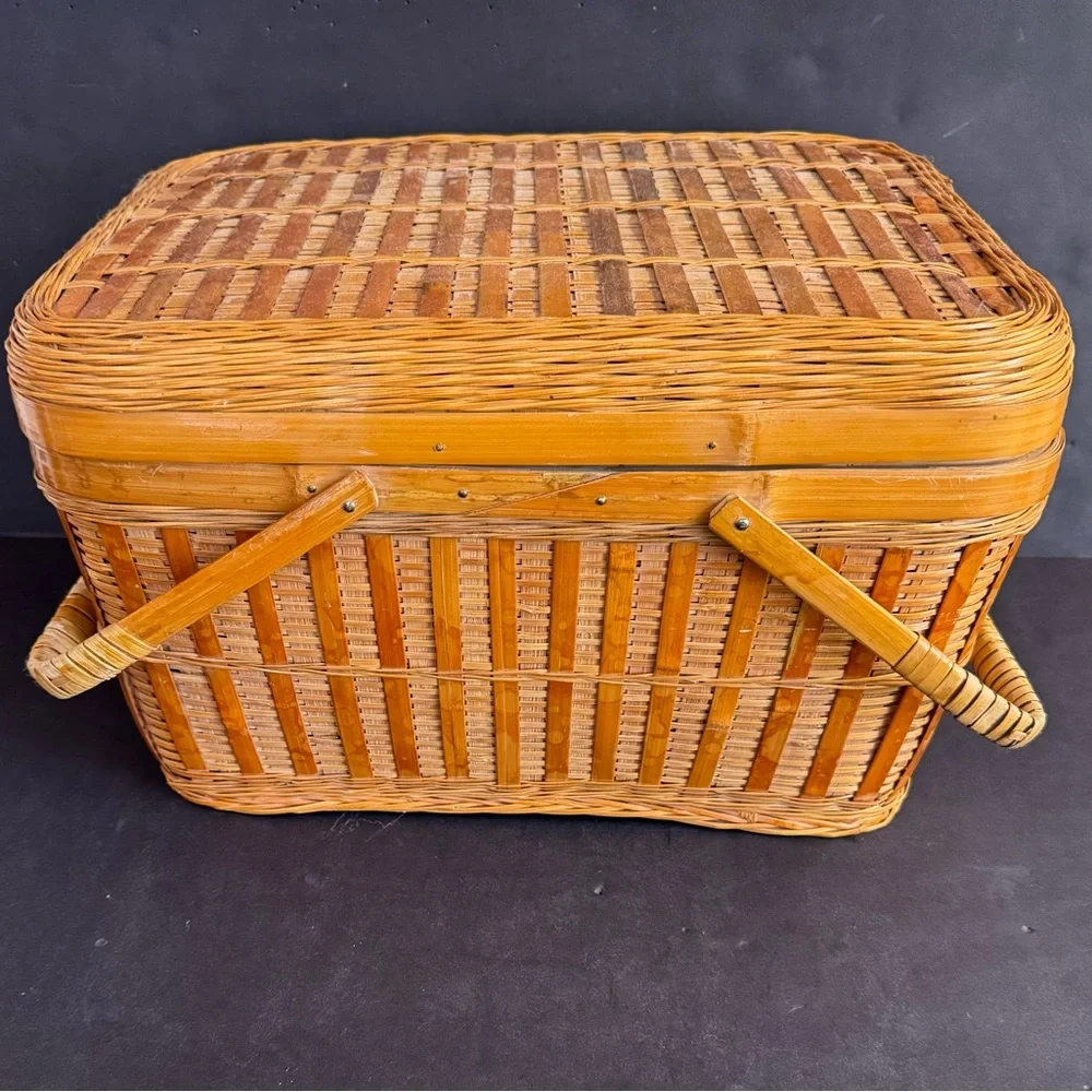 Large Vintage Handmade tan rattan picnic basket with handles.